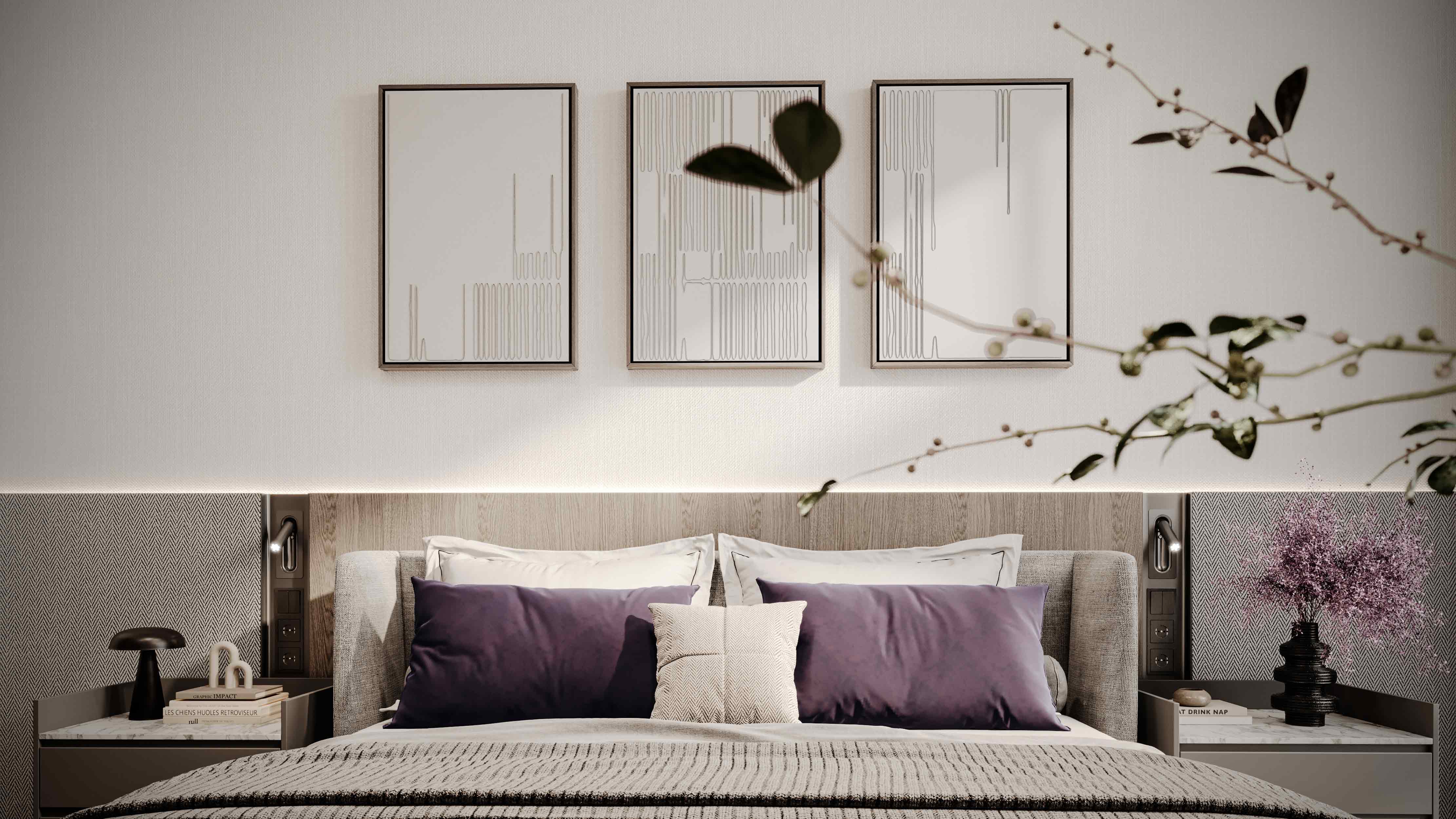 Le Blanc A modern bedroom featuring a neutral color palette, decorative pillows, and framed artwork above the bed.
